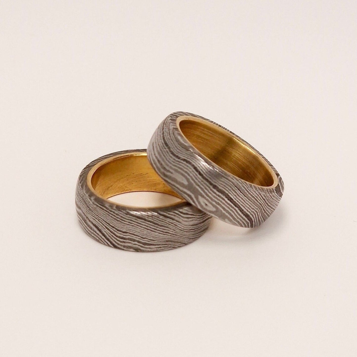 Dmascus Brass ring barrel one on top of the other