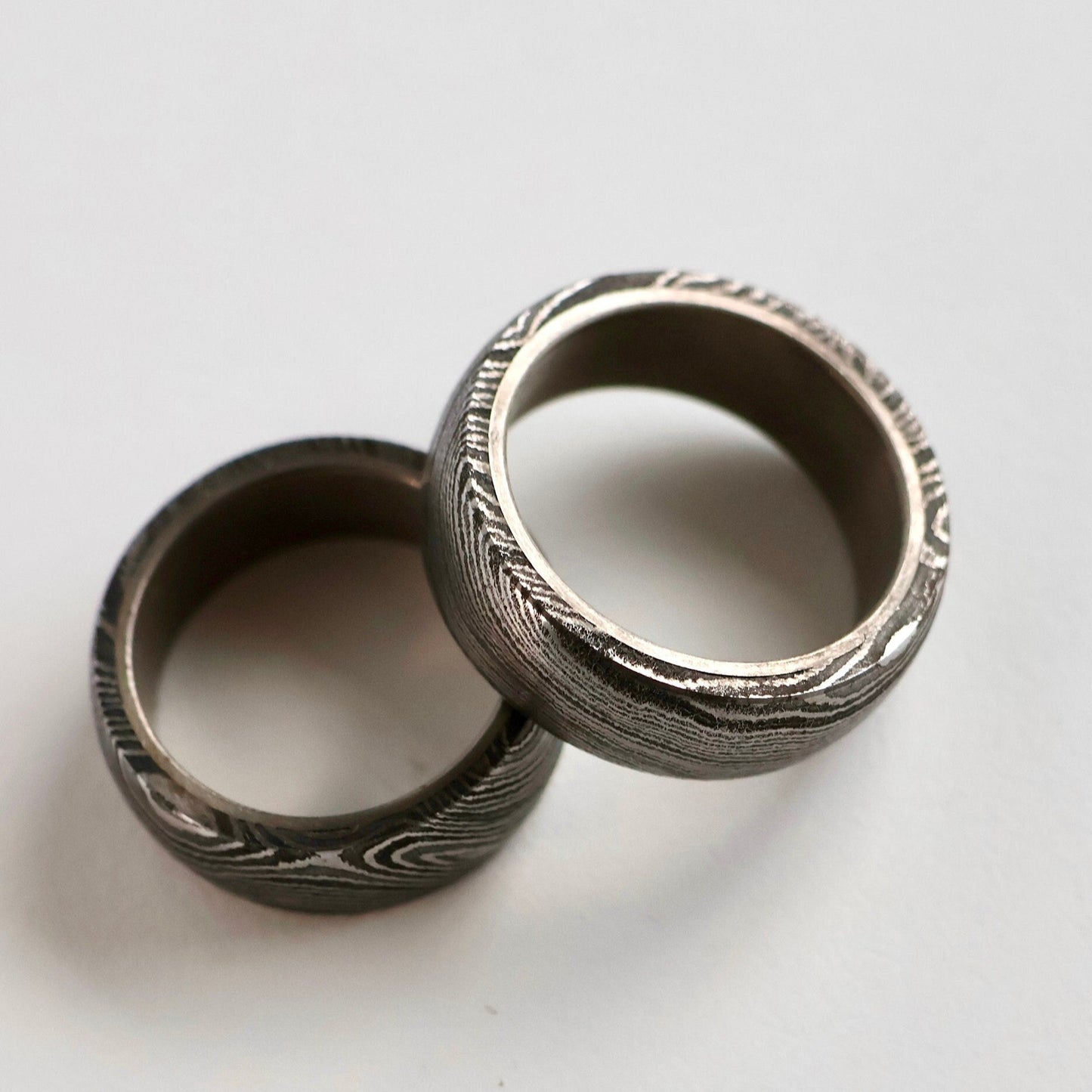 Damascus steel ring pair of two from op view