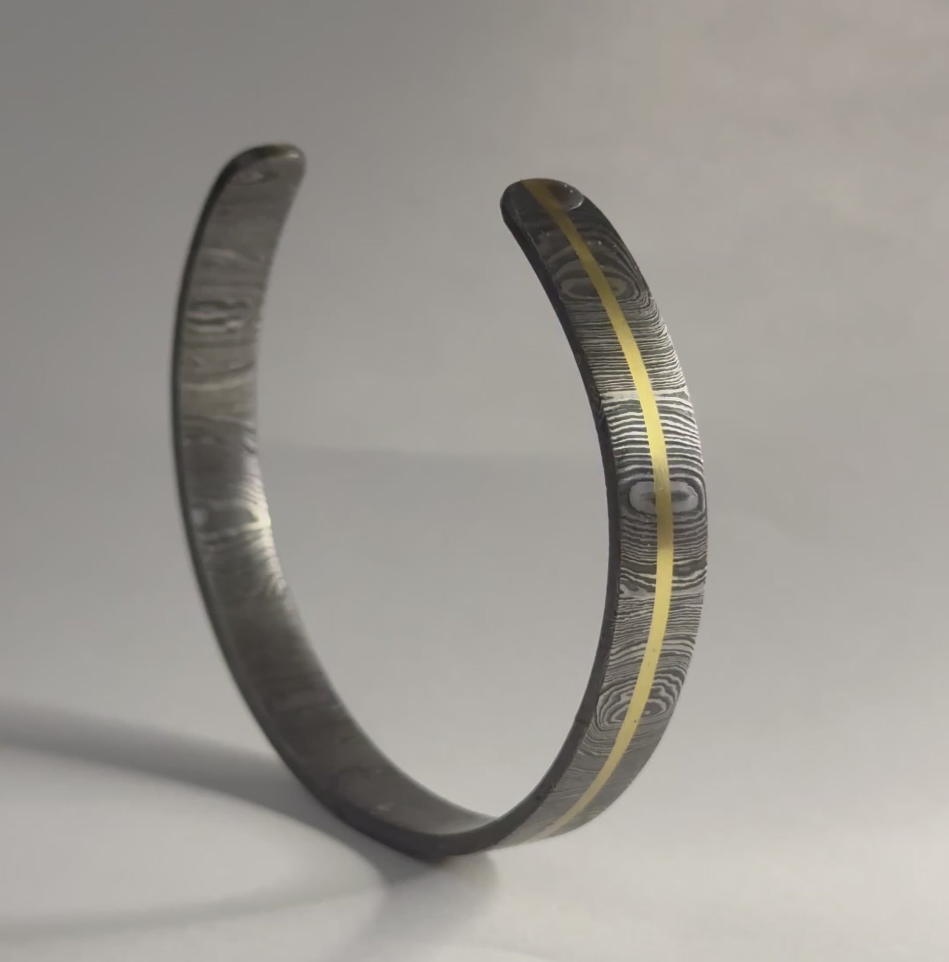 Video of damascus steel cuff close up