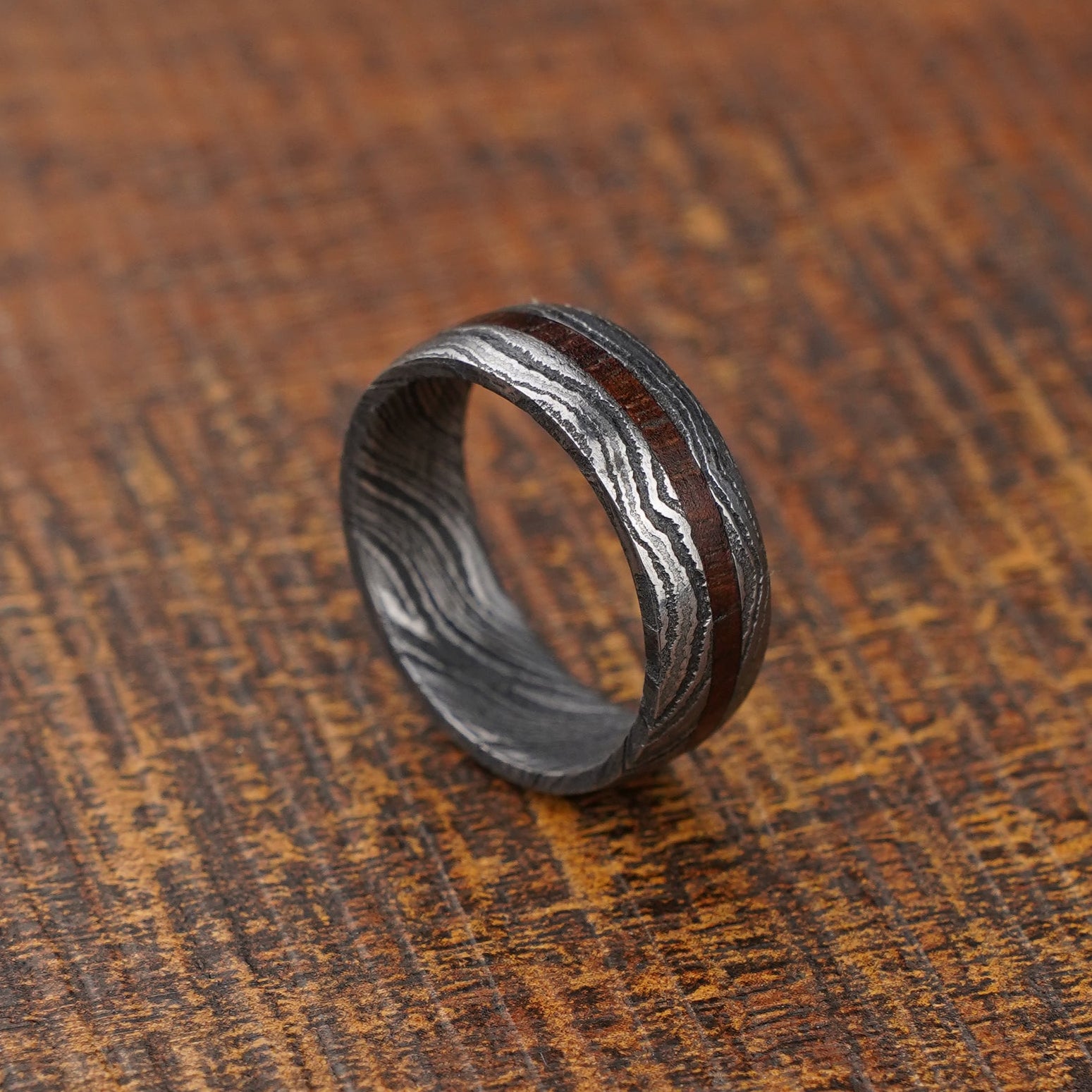 Damascus steel with wooden inlay 